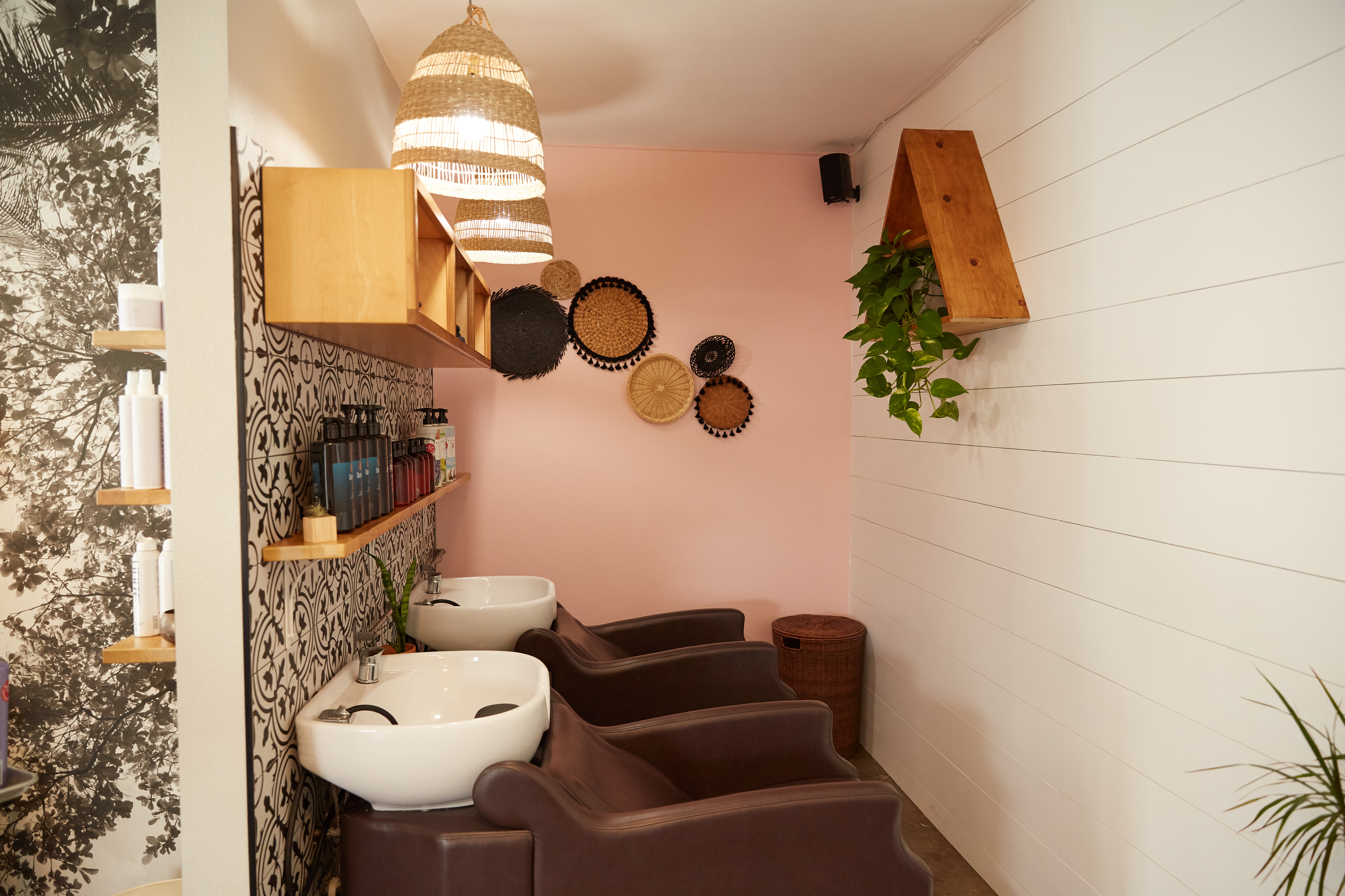 Heat Protectant for Hair Image of salon with 2 sinks and some hair styling products on the shelf