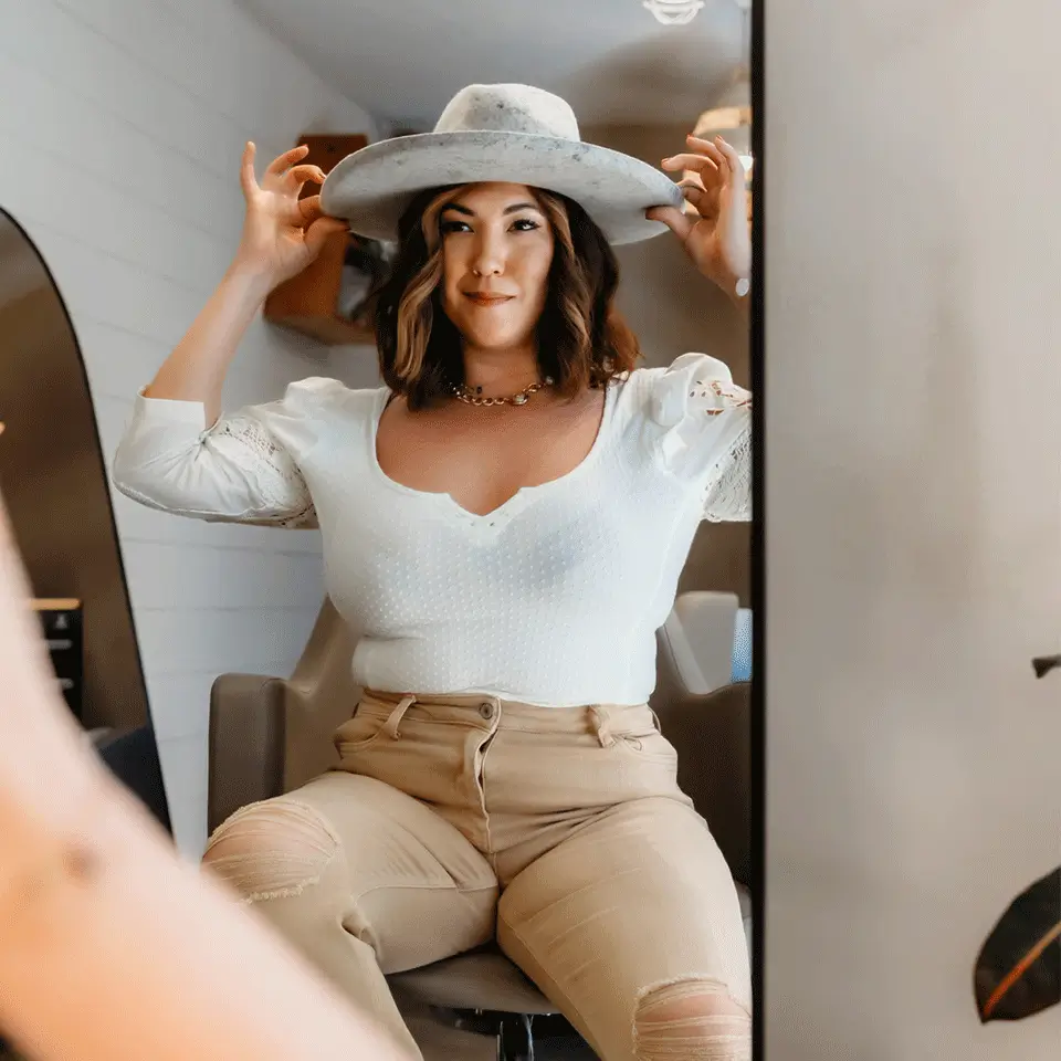 Hair extension tools at Coop Salon in Orange County, California Nicole-Hanna-in-Front-of-Mirror